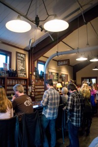 Customers stand in line at the Civil Life's cash-only bar. The Civil Life is known for its malt-driven, sessionable and well-crafted beers.