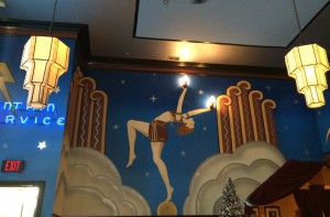 Hand painted murals by Joy Grdnic, owner of the restaurant, line the walls of the Fountain on Locust. These paintings are made to resemble 1930s art deco.