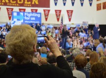 A Hillary supporter takes a picture of the rally. Hillary's rally attracted an older crowd than Bernie Sanders' rally. 