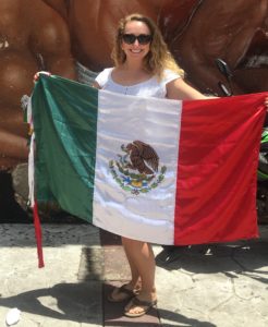 Me holding the flag of México. 