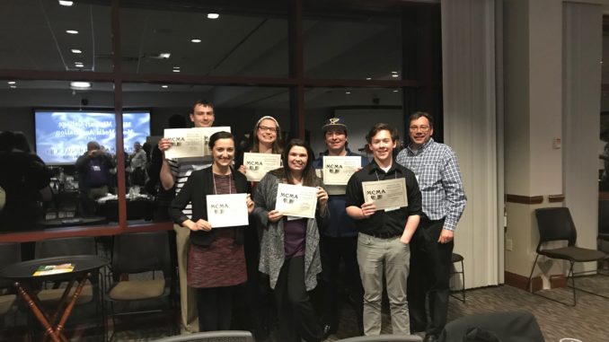 The Index executives and staff pose with certificates signifying awards from the 2018 Missouri College Media Association Convention.