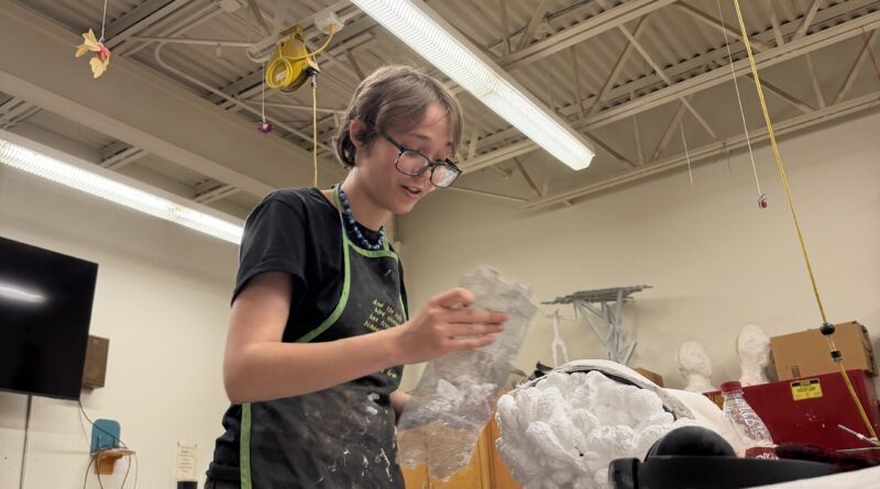 Art students choose between groceries and art supplies